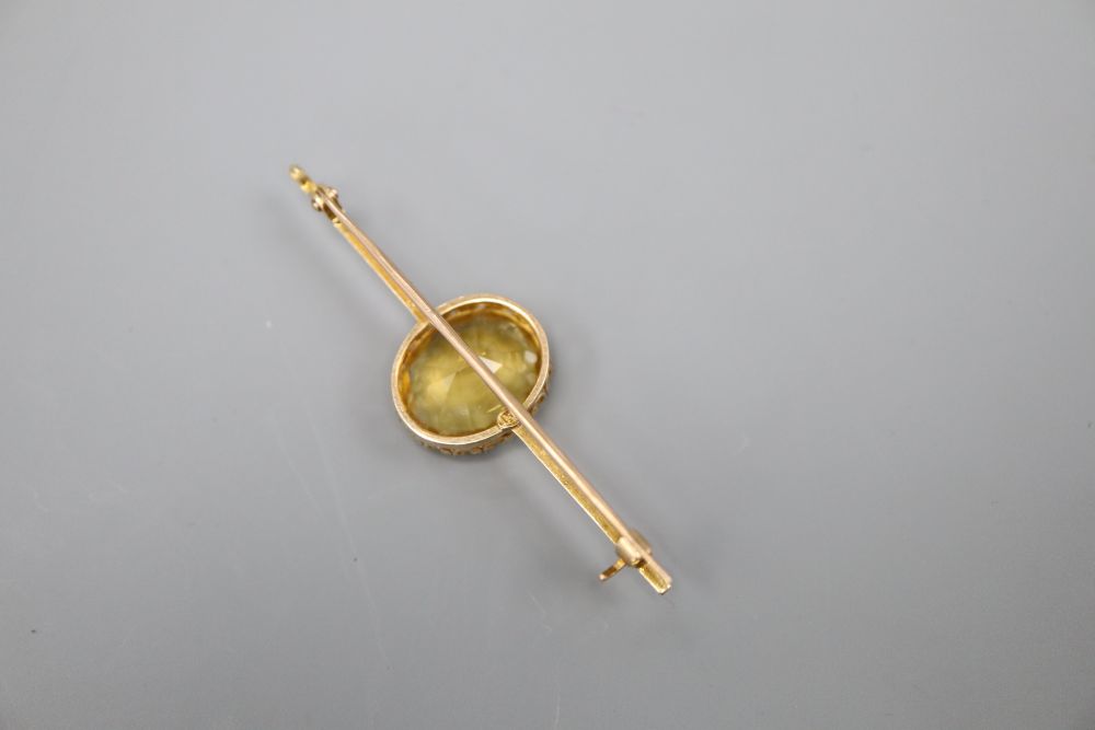 A 15ct gold gem set bar brooch, 5.25cm